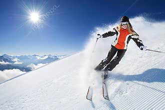 Girl / Woman / Female On the Ski at sunny day