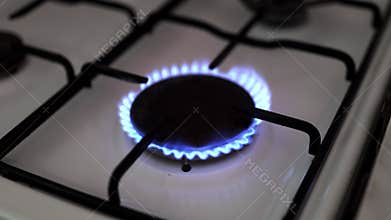 Gas stove with flame, energy crisis, price increase