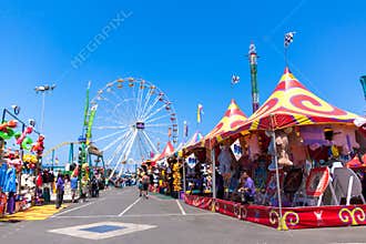 Carnival rides and games at the fair