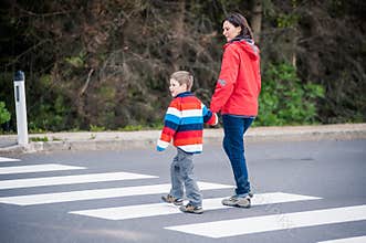 Mother and Son crossing the Street