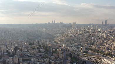 Drone video of an Arab city on the slopes of the mountains.