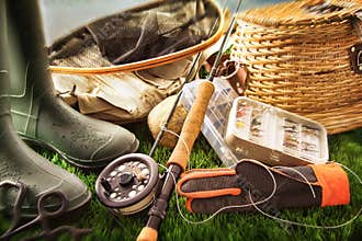 Fly fishing equipment on grass