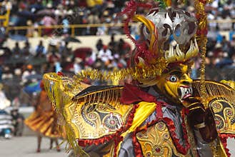 PERU, FEB 03, 2019: people with mask ,playing music and dancer in carnaval Festival of the Virgen de la Candelaria from Puno