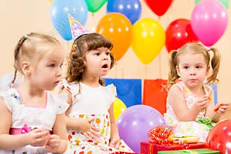 Funny children girls on birthday party