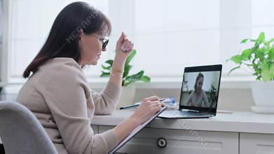 Online meeting of teenage girl with female psychologist, teacher