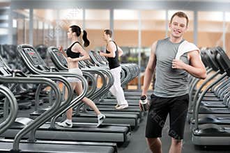 Young man in fitness club