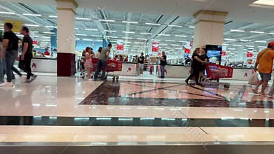 Alicante, Spain - May 17, 2025: families shopping inside a large retail store in the afternoon