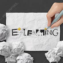 Word E-LEARNING on dark crumpled paper