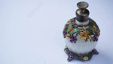 very beautiful perfume container with floral motif