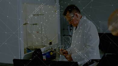 Scientist entering lab activating overlay, inspecting gauges adjusting valve noting calibration