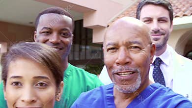 Outdoor Portrait Of Medical Team Outside Hospital