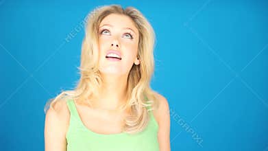 Blonde woman looking arround empty space