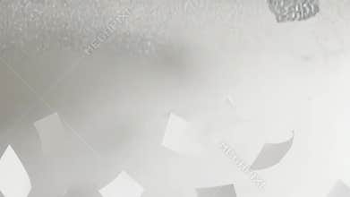 White papers floating in a bright airy space