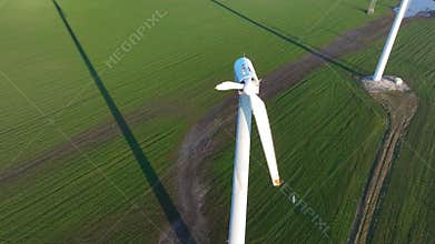 Close-up of a destroyed wind turbine generator. Strong winds and high speeds break the propellers.