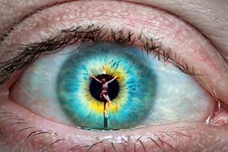 Jesus Christ on the cross reflected in the eye