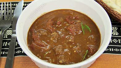 Pappadum Into Beef Curry