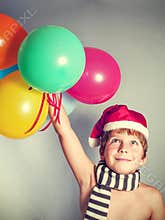 Boy in Santa Claus hat
