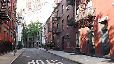 New York City building architecture. Urban residential house exterior. Real estate. Red brick facade