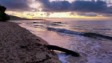 scenic morning at the seashore with flowing waves