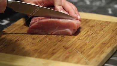 Raw meat slice on board