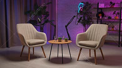 Inspiring Conversation Unfolds in a Modern Podcast Studio With a Cozy Setup