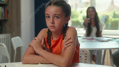 Caucasian kid child daughter pupil schoolgirl studying in classroom primary education lesson classmates cruel children