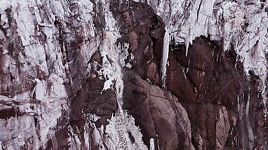Drone view of melting ice and waterfall on Aconcagua, Argentina