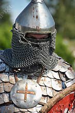 Medieval knight in armor and helmet