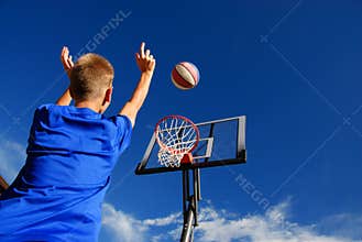 Boy playing basketball