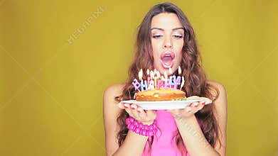 Birthday girl with her cake