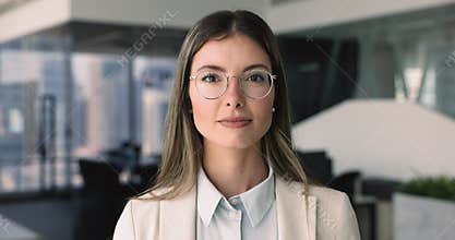 Changing faces of different people looking at camera, headshot portraits