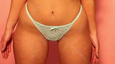 brunette woman in lingerie dancing in the studio