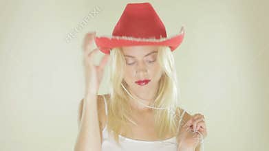 Pretty blonde in a red cowgirl hat