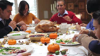 Multi Generation Family Enjoying Thanksgiving Meal