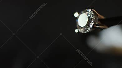 Close-up of a diamond in a ring.
