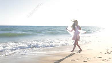 Teenage girl in white floaty