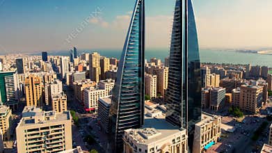 Bahrain world trade center towers rising above manama skyline