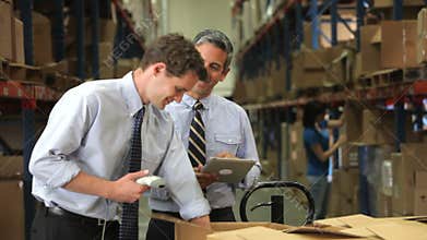 Businessmen With Scanner And Digital Tablet