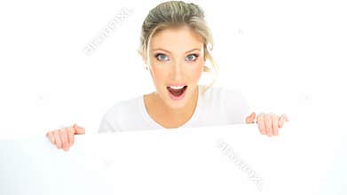 Very exited woman showing a copy space