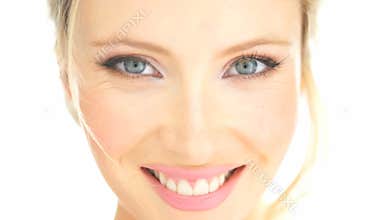 Beauty blonde woman touching her face