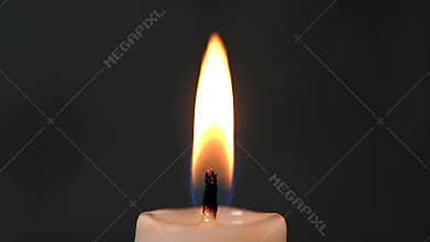 Single Candle Flame Burning in the Dark, Seamless Loop