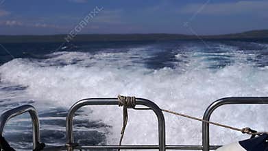 Close up, captivating boat wake on ocean waves