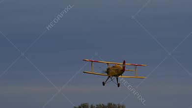 Bucker Bu 133 Jungmeister biplane in a level flight pass