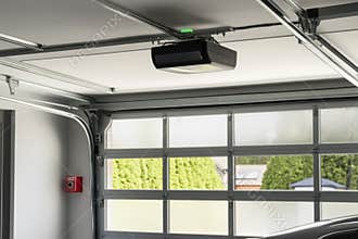 Modern garage with new automatic garage door opener installed for convenience