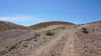 driving up on a dirt road in the Altai mountains