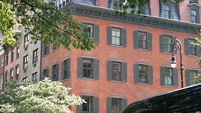 New York City building architecture. Urban residential red brick house. Manhattan real estate, USA.