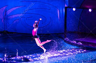 Aqua show on the cruise ship Allure of the Seas of Royal Caribbean cruise line. Professional divers