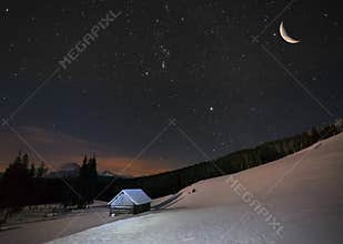 Beautiful winter landscape in the mountains to night with stars
