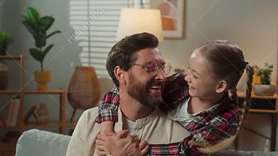 Caucasian family happy at home living room man father dad using mobile phone online smartphone chatting sudden child kid