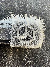 Mercedes stamp covered in frost